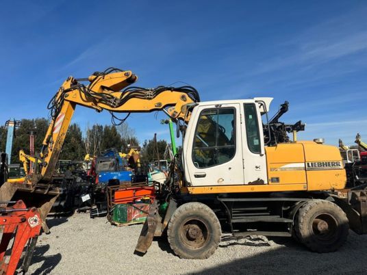 2006 Liebherr A314 wheel excavator, side profile view 2006 Liebherr A314 wheel excavator, side profile view