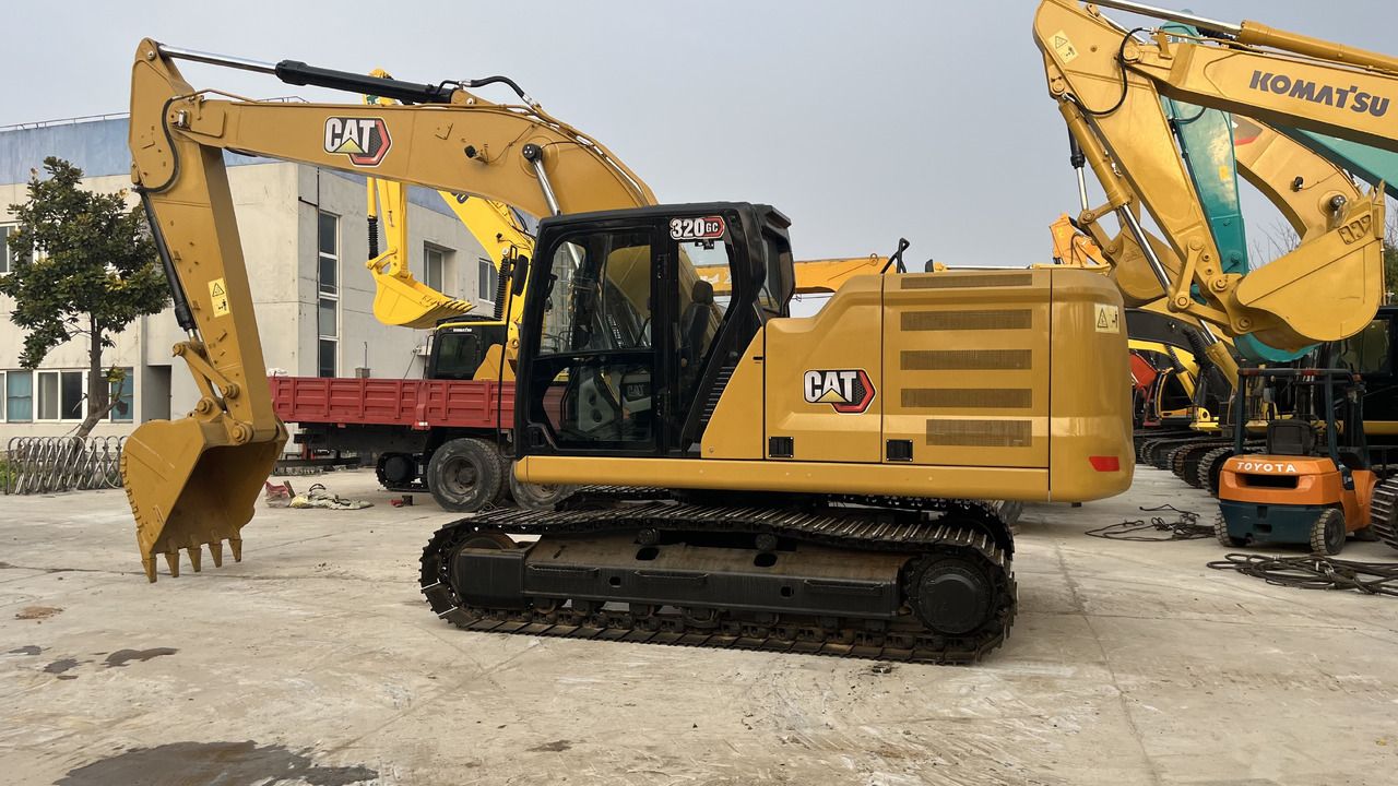 2024 Caterpillar 320GC crawler excavator, side view 2024 Caterpillar 320GC crawler excavator, side view