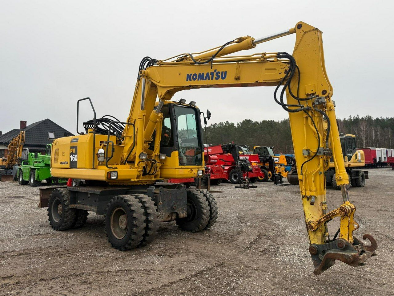 2007 Komatsu PW160-7H wheel excavator, side view