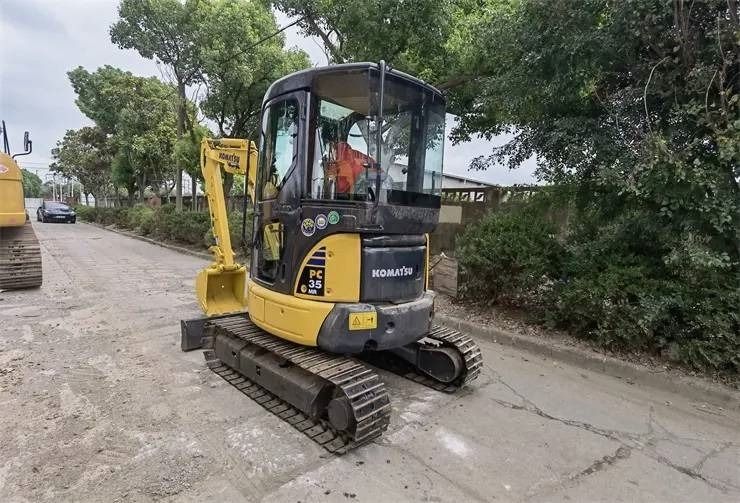 2023 Komatsu PC35 mini excavator, rear three-quarter view 2023 Komatsu PC35 mini excavator, rear three-quarter view