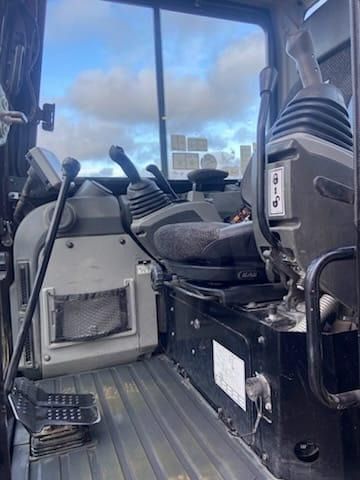 2022 Caterpillar 305E2 mini excavator interior cab view 2022 Caterpillar 305E2 mini excavator interior cab view