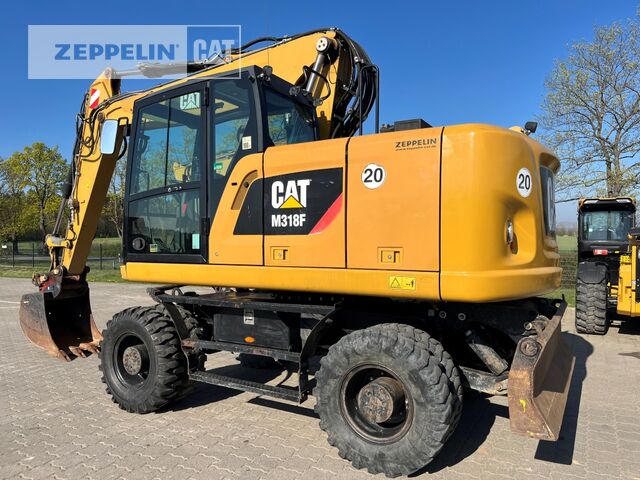 2015 Caterpillar M318F wheel excavator side view 2015 Caterpillar M318F wheel excavator side view