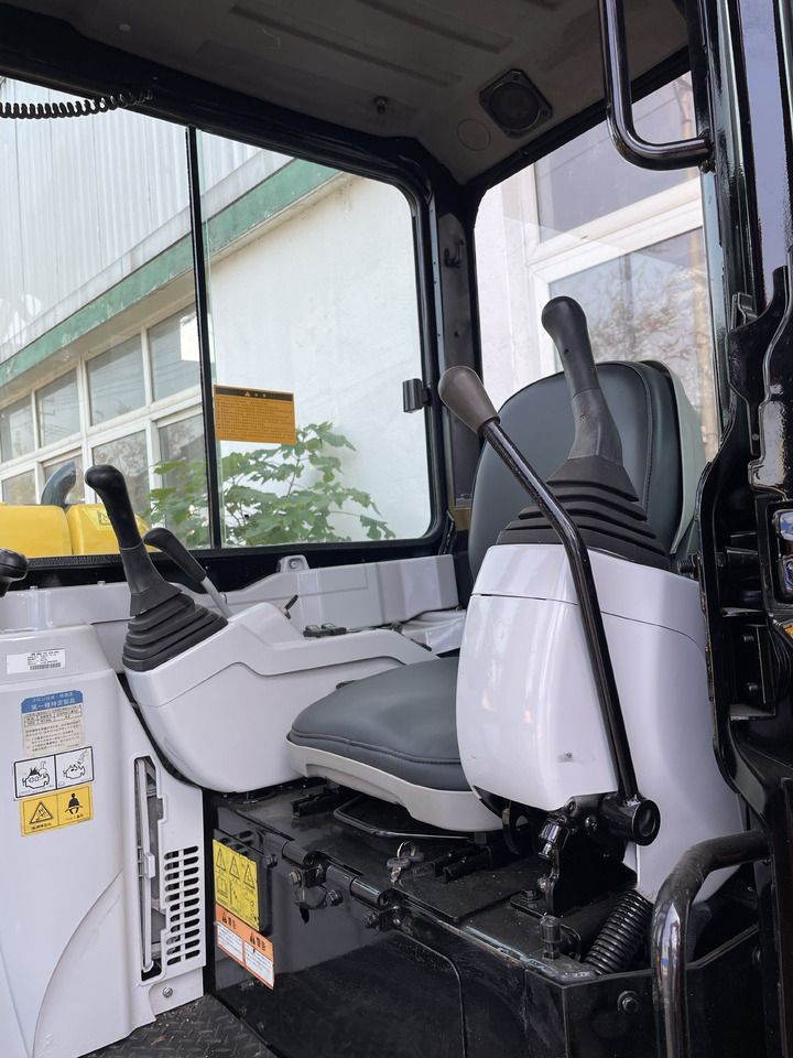 2024 Caterpillar 303.5E mini excavator interior cab view 2024 Caterpillar 303.5E mini excavator interior cab view