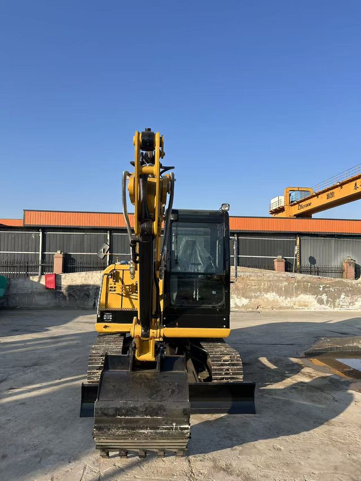 2024 Caterpillar 305.5E2 mini excavator, front view 2024 Caterpillar 305.5E2 mini excavator, front view