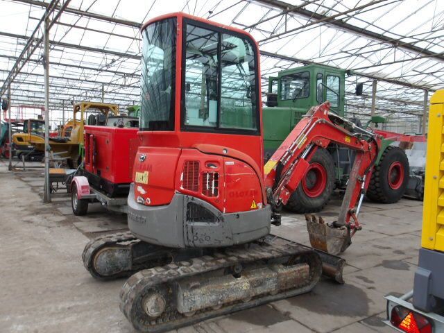 2014 Yanmar VIO25-4 mini excavator, rear three-quarter view 2014 Yanmar VIO25-4 mini excavator, rear three-quarter view