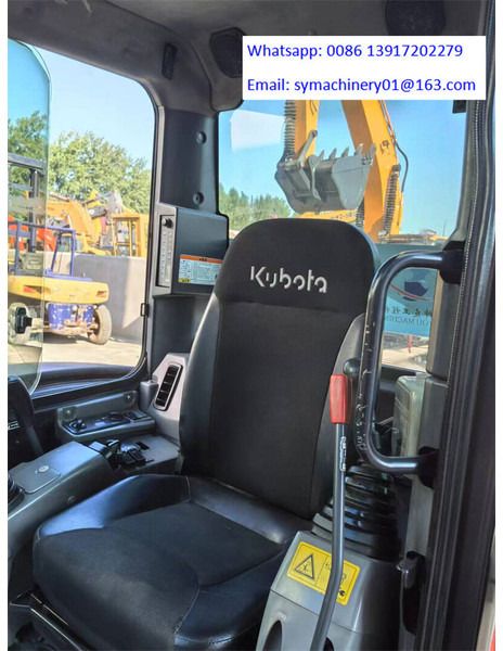 2023 Kubota KX057-4 mini excavator interior cab view 2023 Kubota KX057-4 mini excavator interior cab view