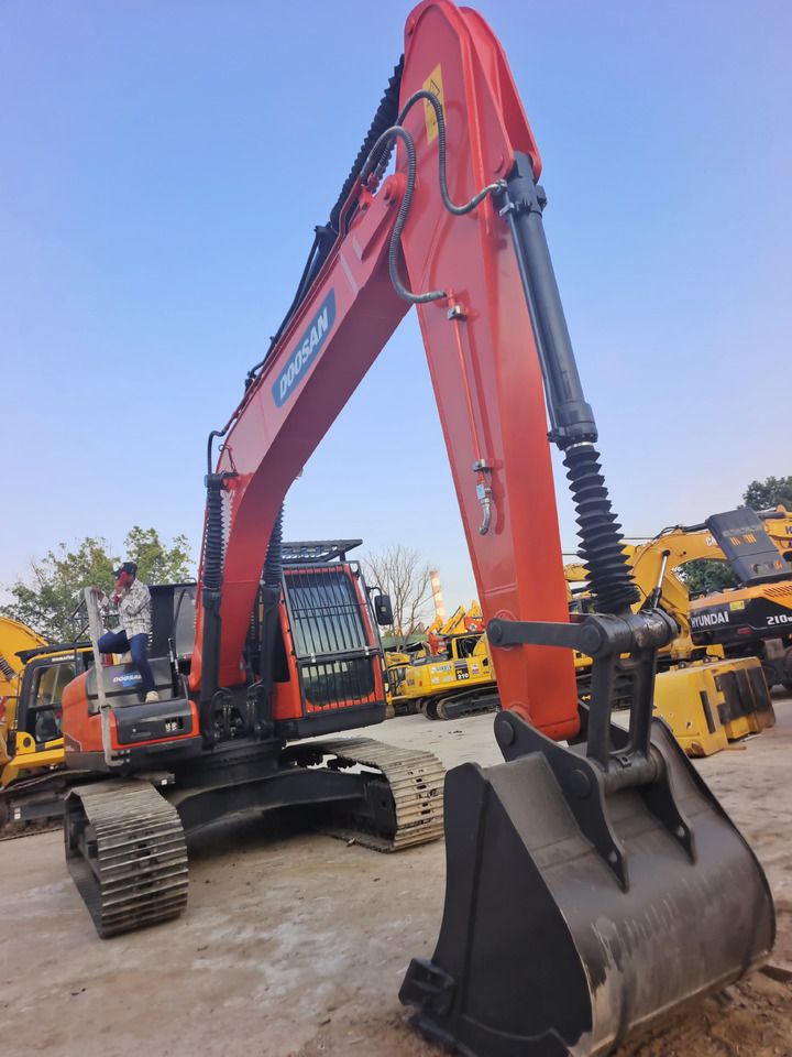 2024 Doosan DX225LC-9C crawler excavator, front three-quarter view