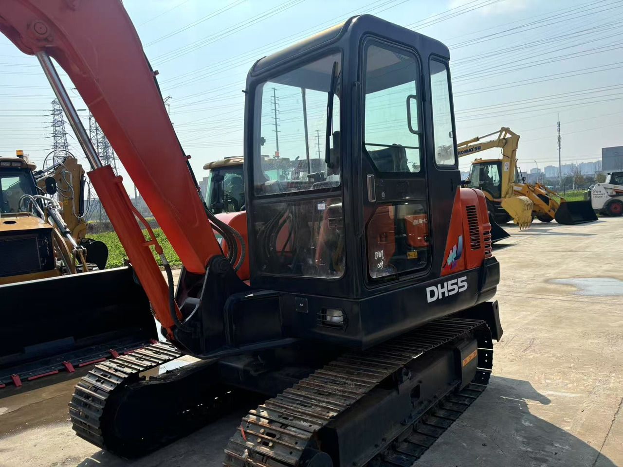 2020 Doosan DH55 mini excavator, side view 2020 Doosan DH55 mini excavator, side view