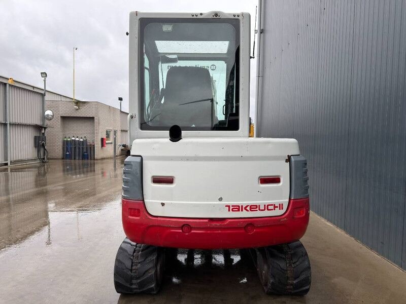 2010 Takeuchi TB235 mini excavator rear view 2010 Takeuchi TB235 mini excavator rear view