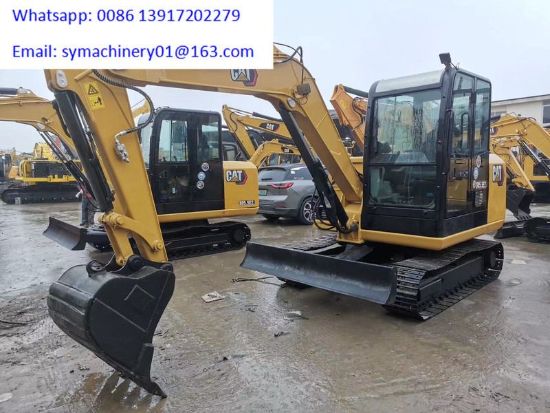 2023 Caterpillar 305.5E2 mini excavator, front three-quarter view 2023 Caterpillar 305.5E2 mini excavator, front three-quarter view