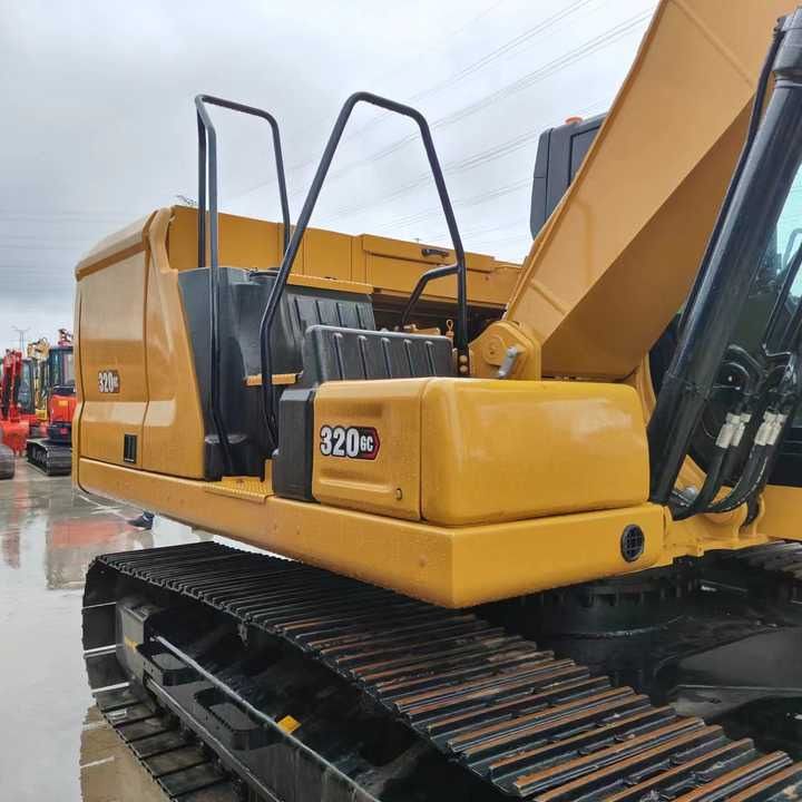 Caterpillar 320GC crawler excavator, rear three-quarter view