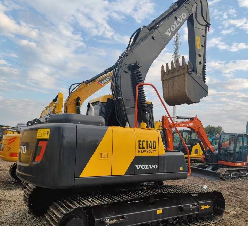 2021 Volvo EC140 crawler excavator, rear three-quarter view