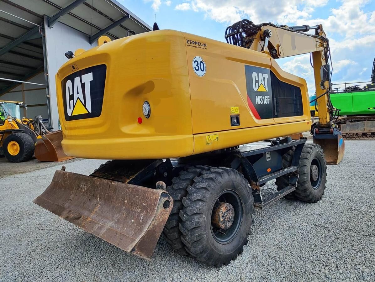 2018 Caterpillar M316F wheel excavator, rear three-quarter view