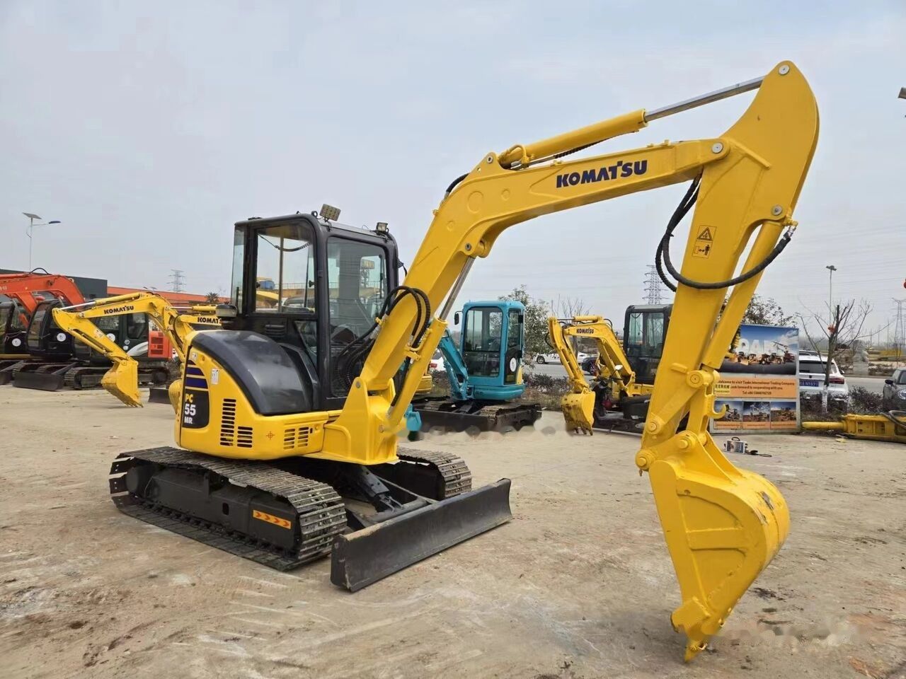 2022 Komatsu PC-55MR mini excavator, three-quarter view 2022 Komatsu PC-55MR mini excavator, three-quarter view