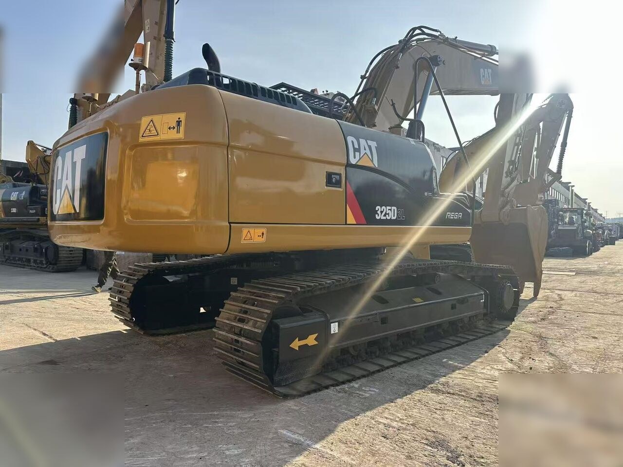 2024 Caterpillar 325D2L crawler excavator, rear three-quarter view 2024 Caterpillar 325D2L crawler excavator, rear three-quarter view