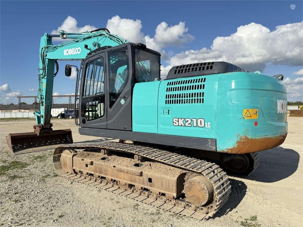 2015 Kobelco SK210LC-10 crawler excavator, rear three-quarter view 2015 Kobelco SK210LC-10 crawler excavator, rear three-quarter view