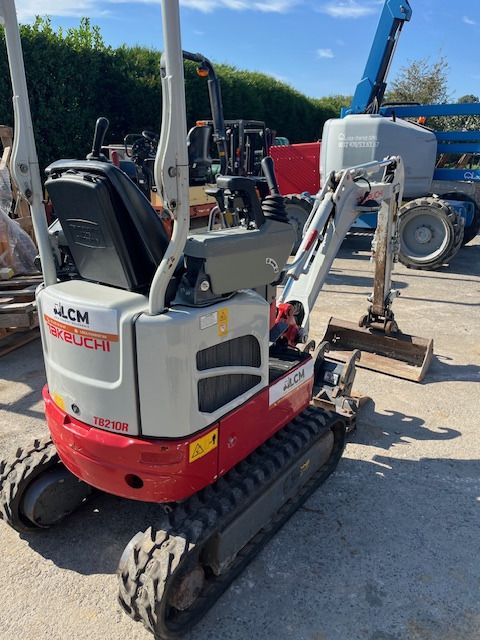 2023 Takeuchi TB210R mini excavator, rear three-quarter view 2023 Takeuchi TB210R mini excavator, rear three-quarter view