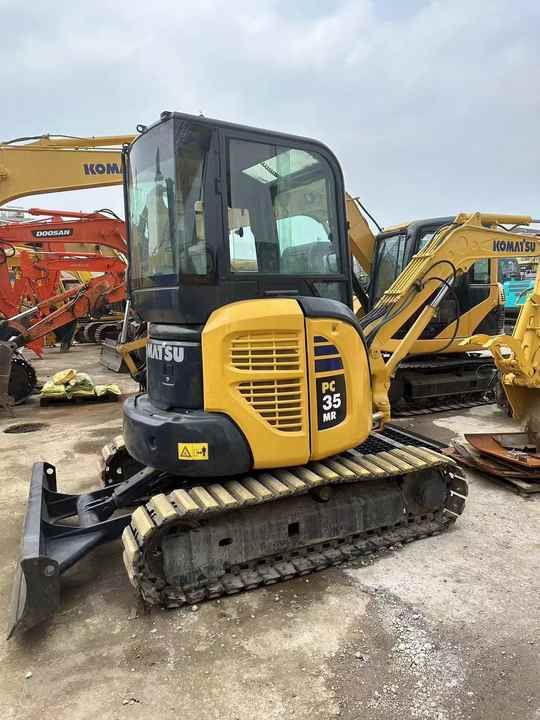 2021 Komatsu PC35 MR mini excavator, rear three-quarter view 2021 Komatsu PC35 MR mini excavator, rear three-quarter view