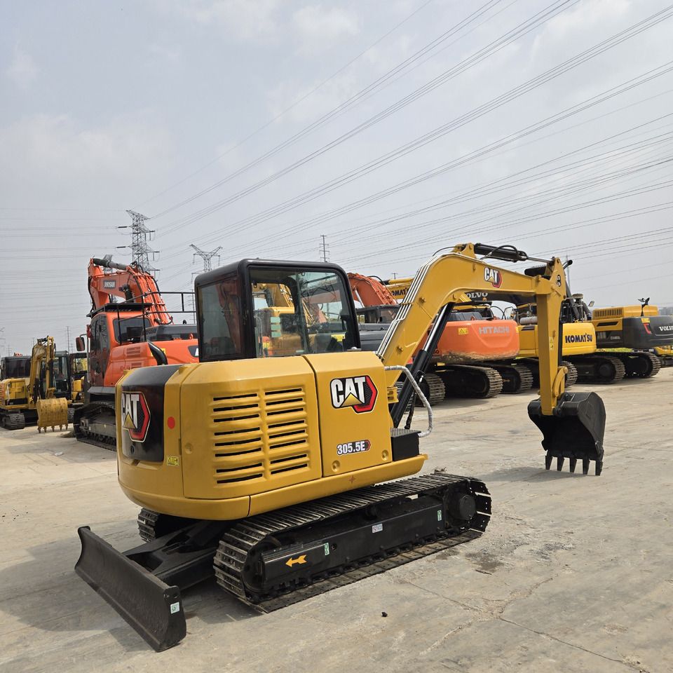2023 Caterpillar 305.5E mini excavator, rear three-quarter view 2023 Caterpillar 305.5E mini excavator, rear three-quarter view