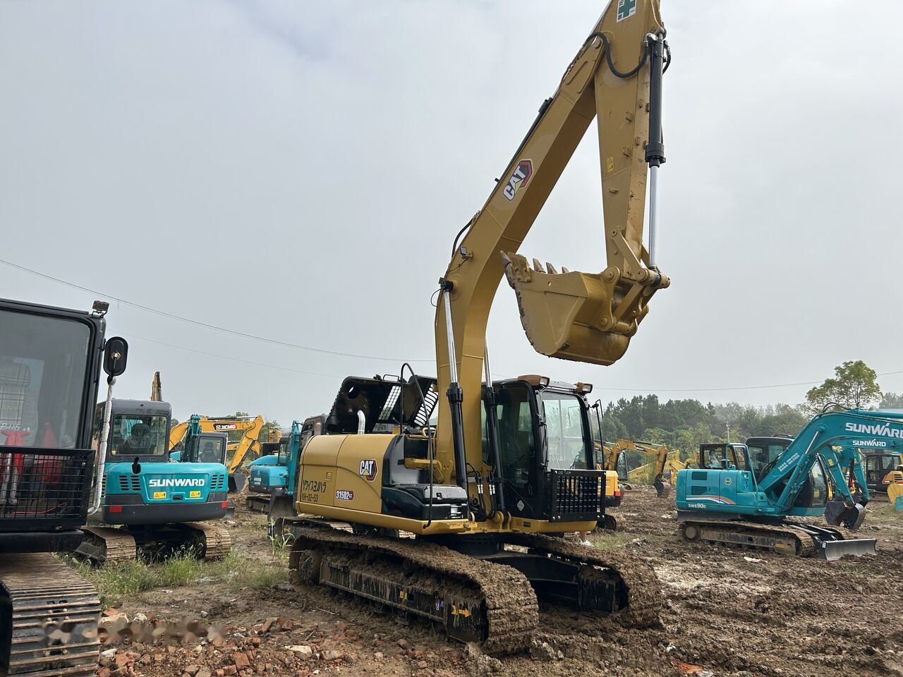 Caterpillar 315D2GC crawler excavator, side view Caterpillar 315D2GC crawler excavator, side view