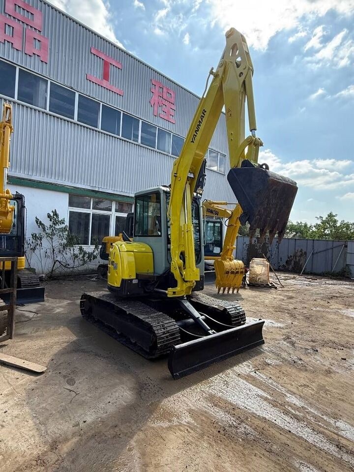 2025 Yanmar VIO55 mini excavator, three-quarter front view 2025 Yanmar VIO55 mini excavator, three-quarter front view