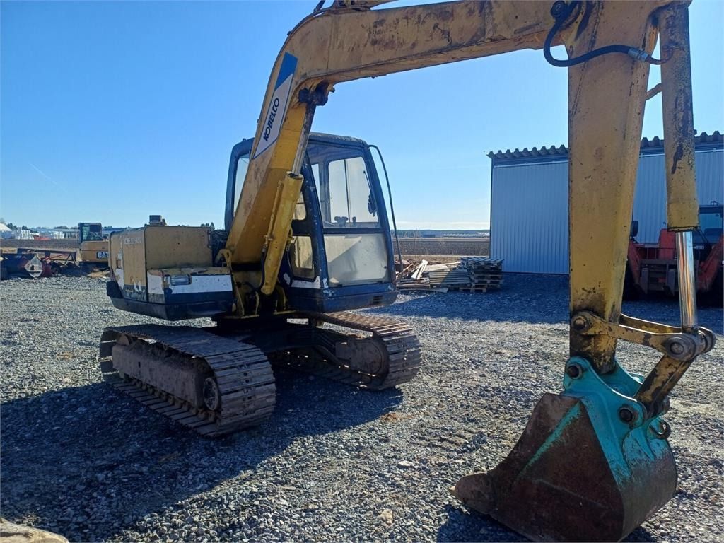 Kobelco SK60 mini excavator, side view