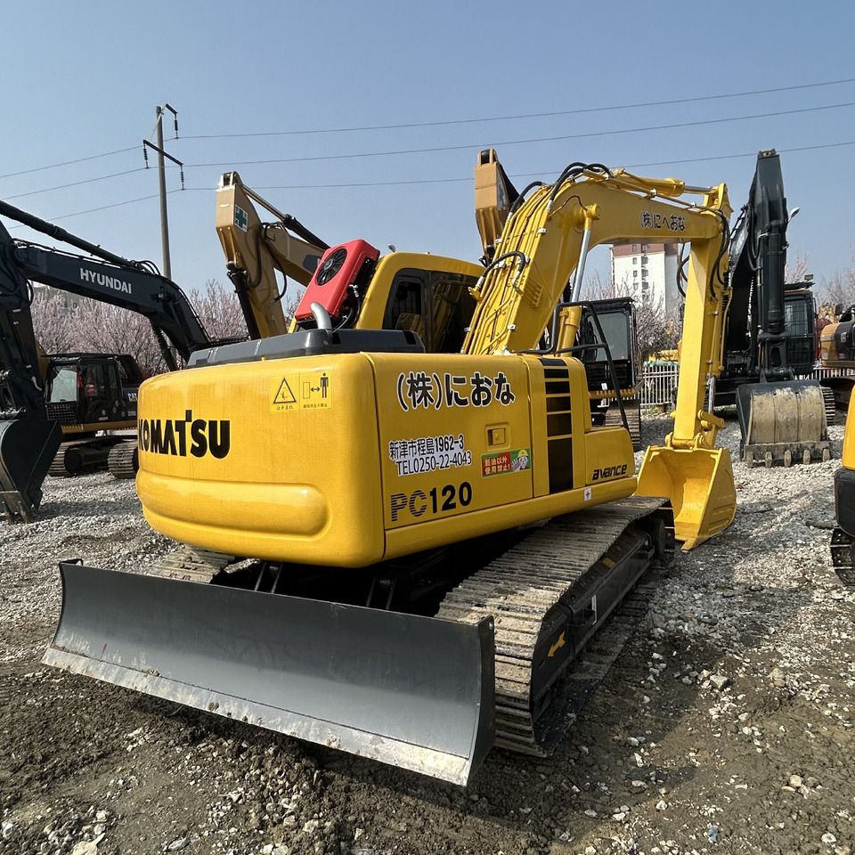 2014 Komatsu PC120-8 crawler excavator, rear three-quarter view 2014 Komatsu PC120-8 crawler excavator, rear three-quarter view