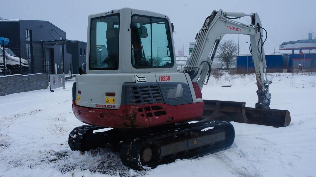 2012 Takeuchi TB250 mini excavator, rear three-quarter view