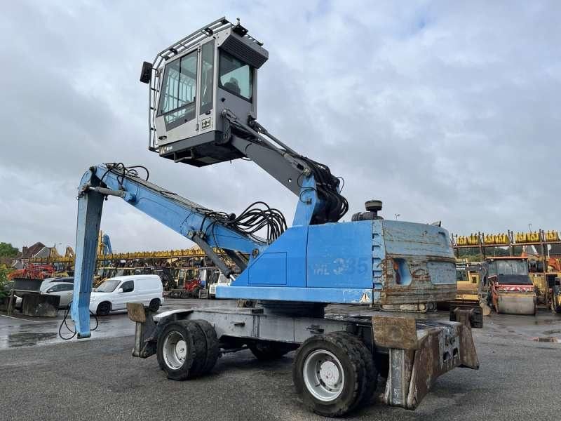 2011 Fuchs MHL335 material handler, side view