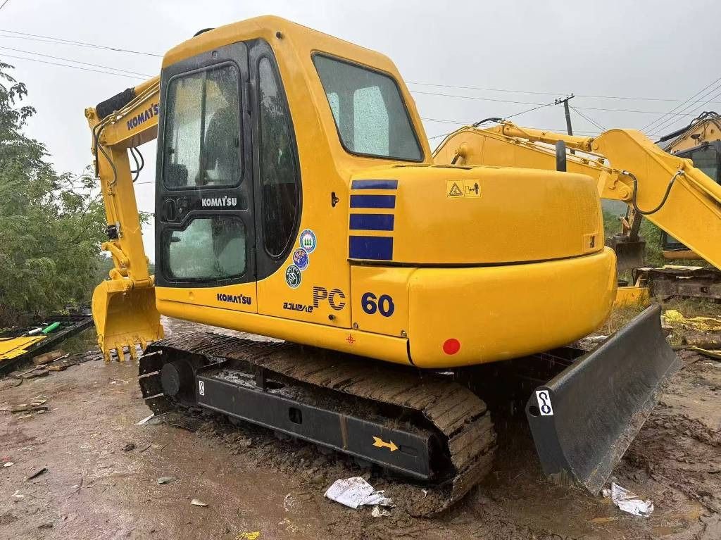 2025 Komatsu PC60 mini excavator, rear three-quarter view 2025 Komatsu PC60 mini excavator, rear three-quarter view