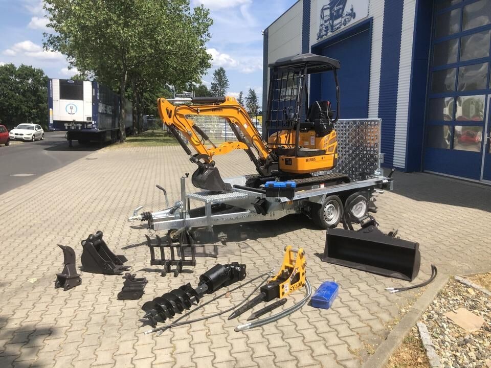 Berger Kraus BK1700JS mini excavator on trailer with attachments Berger Kraus BK1700JS mini excavator on trailer with attachments