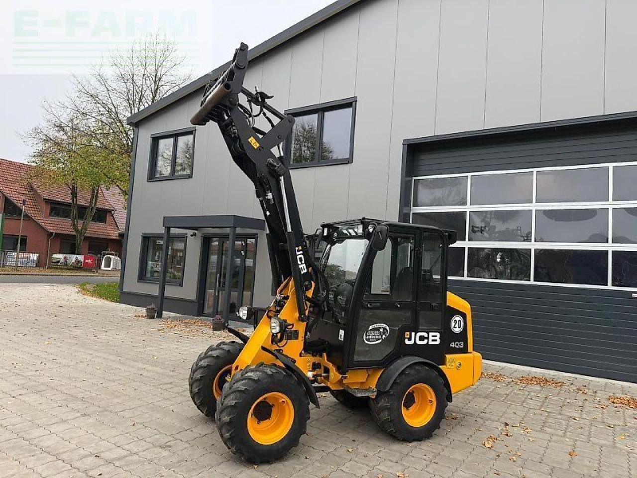 2022 JCB 403 Smart Power High Lift wheel loader, front three-quarter view