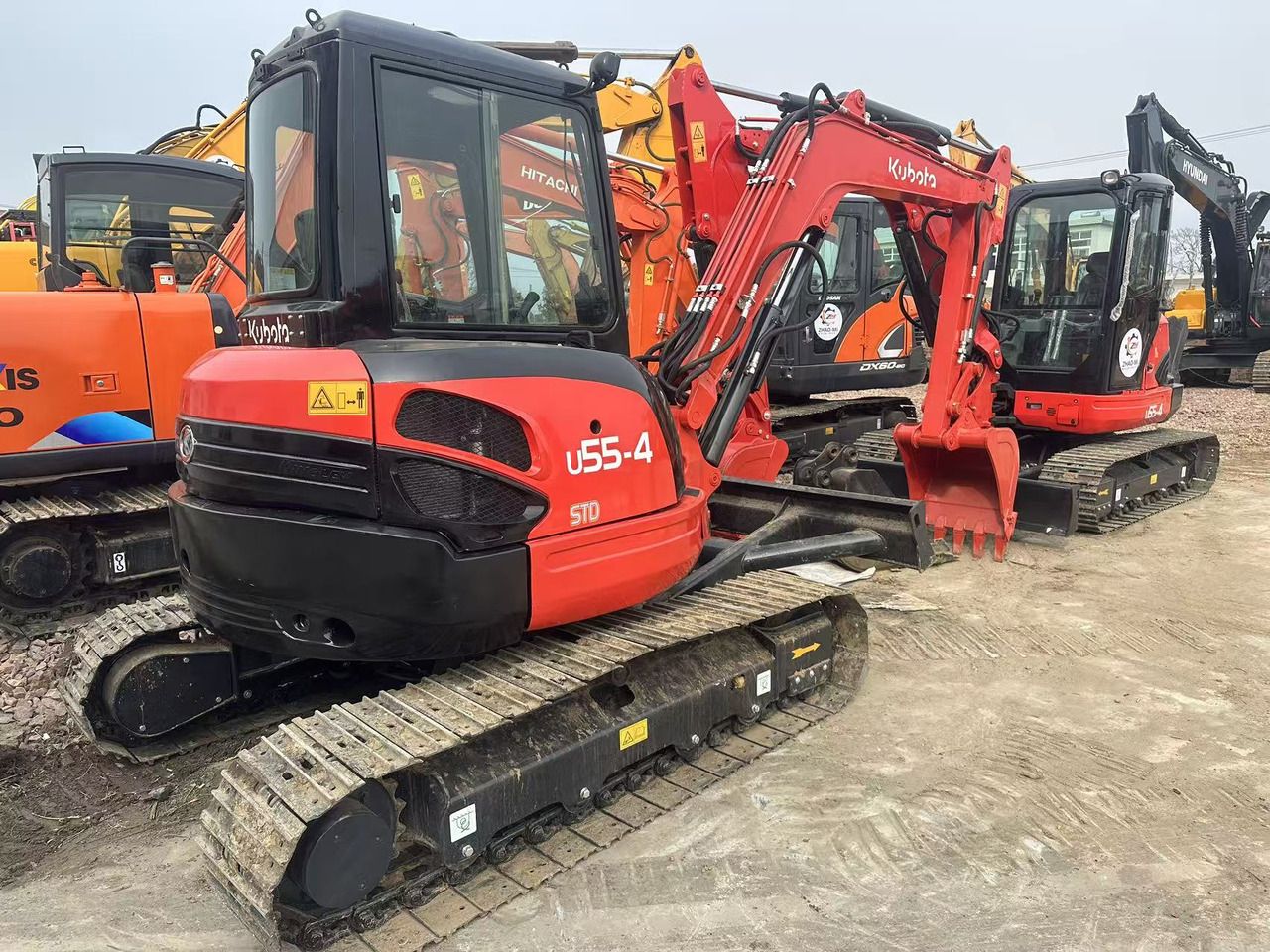 2024 Kubota U55-4 mini excavator, rear three-quarter view