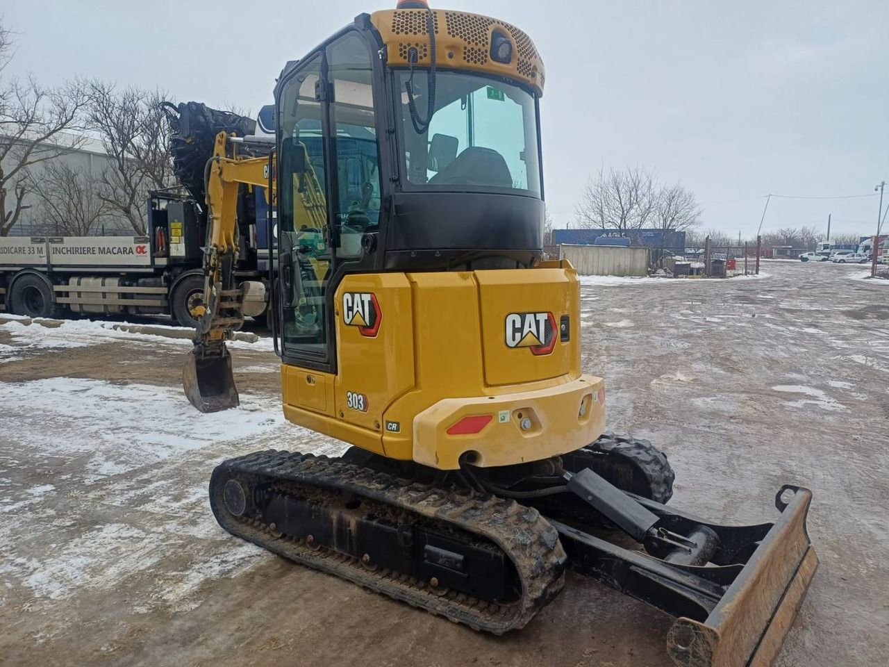 2024 Caterpillar 303-07CR crawler excavator, rear three-quarter view