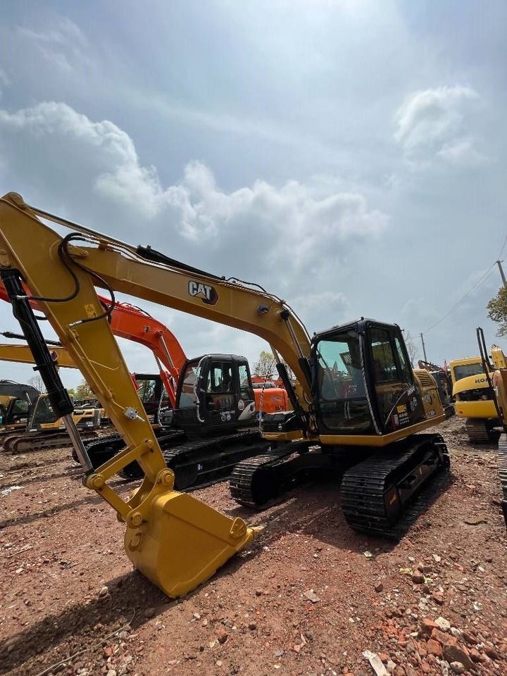2024 Caterpillar 312 crawler excavator, front three-quarter view 2024 Caterpillar 312 crawler excavator, front three-quarter view