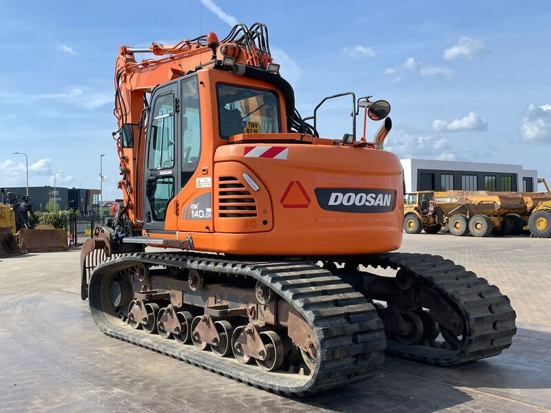 2015 Doosan DX140LCR crawler excavator, rear three-quarter view 2015 Doosan DX140LCR crawler excavator, rear three-quarter view