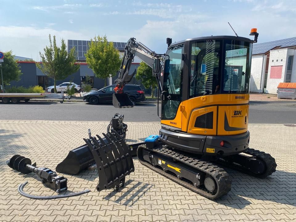 Berger Kraus BK4000KJS mini excavator, side view with attachments