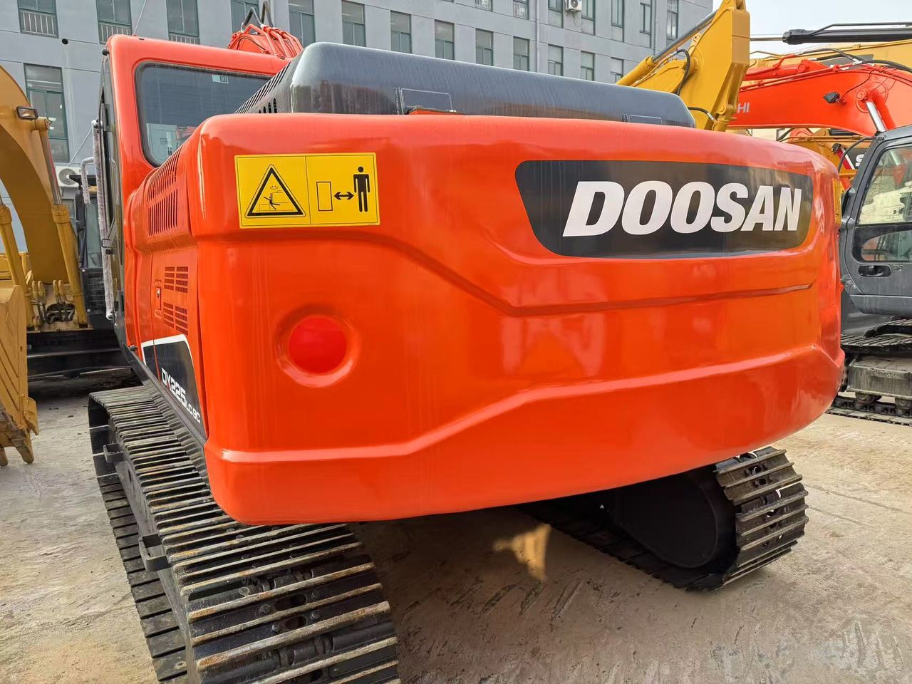 2021 Doosan DX225 crawler excavator rear view 2021 Doosan DX225 crawler excavator rear view
