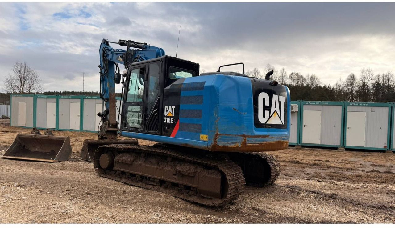 2013 Caterpillar 316EL crawler excavator, rear three-quarter view