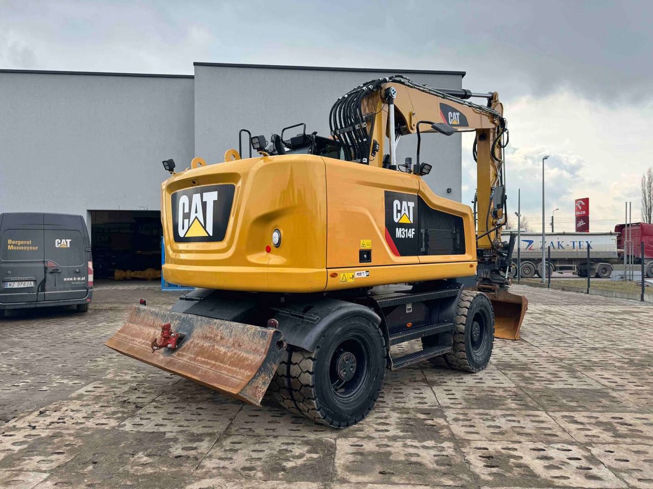 2019 Caterpillar M314F wheel excavator rear three-quarter view 2019 Caterpillar M314F wheel excavator rear three-quarter view