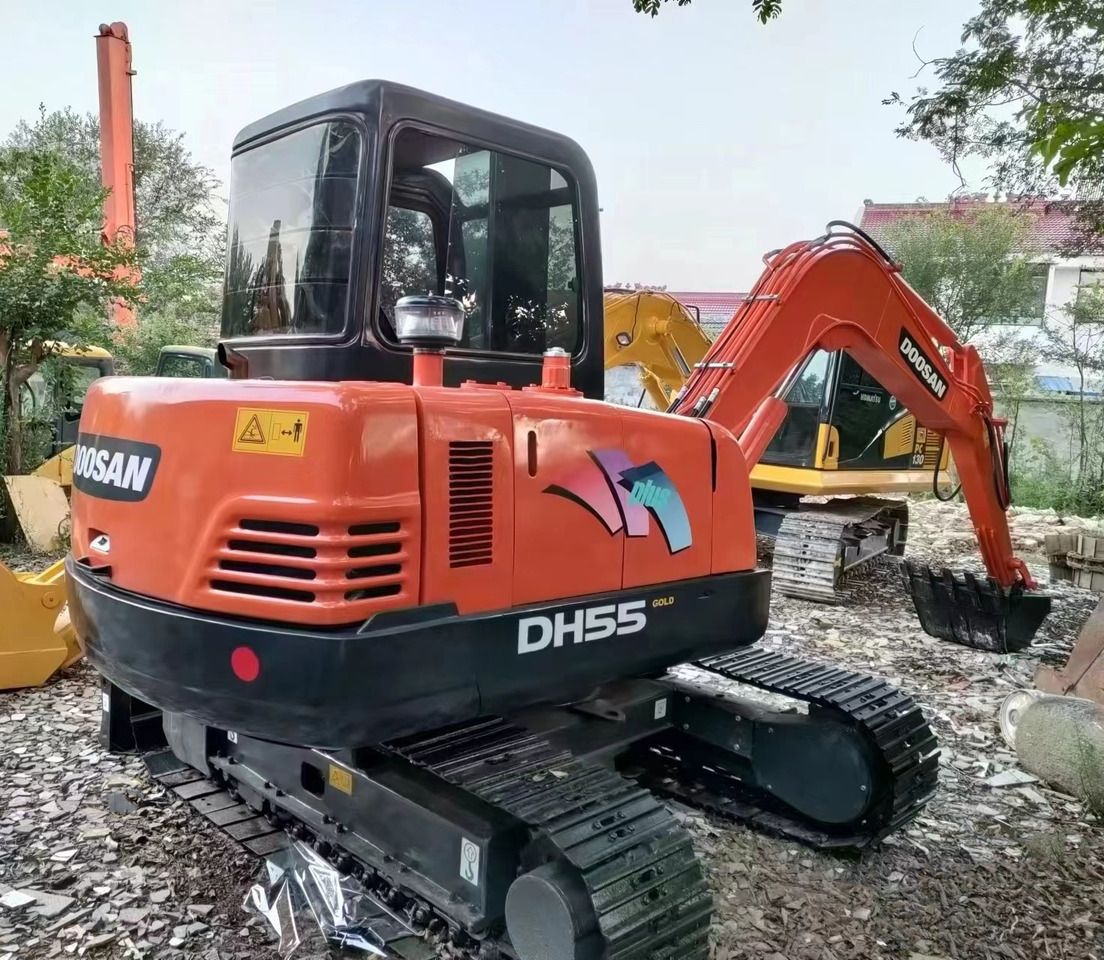 2022 Doosan DH55 mini excavator rear three-quarter view