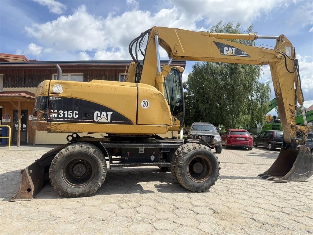 2004 Caterpillar M315C wheel excavator side view 2004 Caterpillar M315C wheel excavator side view