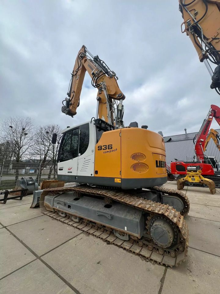 2022 Liebherr R936 Compact crawler excavator, rear three-quarter view 2022 Liebherr R936 Compact crawler excavator, rear three-quarter view