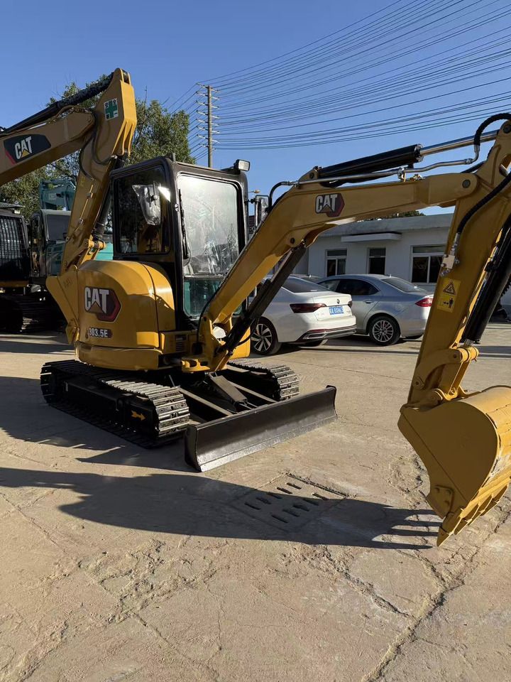 2021 Caterpillar 303.5E mini excavator, front three-quarter view