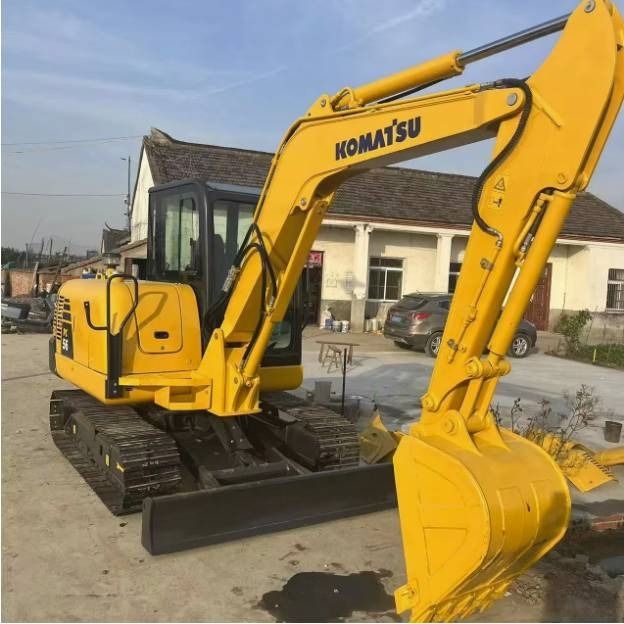 2024 Komatsu PC56-7 mini excavator, rear three-quarter view 2024 Komatsu PC56-7 mini excavator, rear three-quarter view