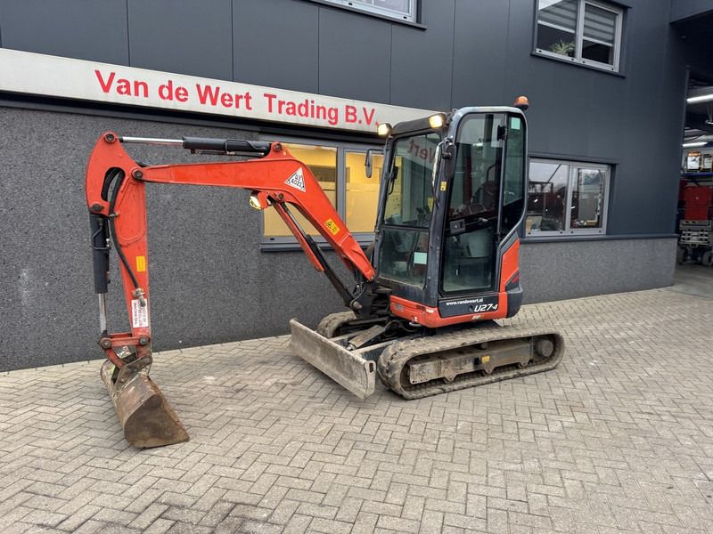 2016 Kubota U27-4 mini excavator, side view 2016 Kubota U27-4 mini excavator, side view
