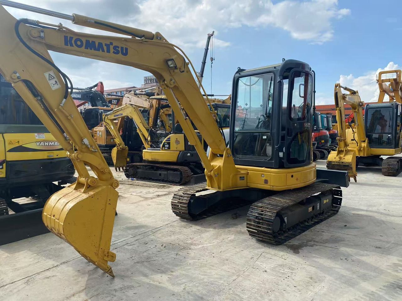 2022 Komatsu PC-55MR mini excavator, front three-quarter view