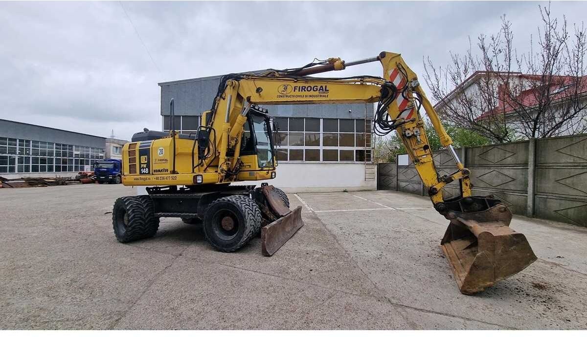 Komatsu PW148-8 wheel excavator, side profile view Komatsu PW148-8 wheel excavator, side profile view