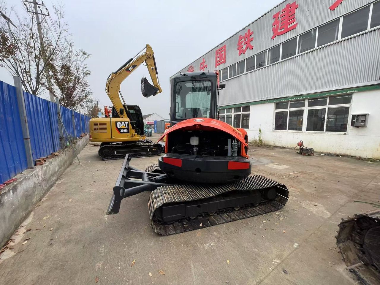 2024 Kubota KX163 mini excavator, rear view with engine cover open
