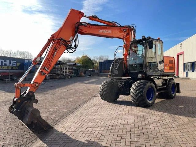 2011 Hitachi ZX140W-3 wheel excavator, side profile view 2011 Hitachi ZX140W-3 wheel excavator, side profile view